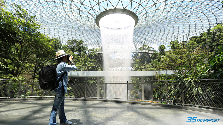 Unwind at Jewel Changi Airport riding there with a shuttle bus in Singapore